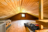 Verlockendes Ferienhaus aus Blockbohlen mit modernen Annehmlichkeiten - Schlafnische